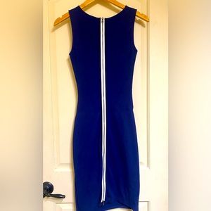 Full length zipper in the back, zipper at top and bottom